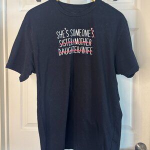 Wear the Peace Graphic Tee – “She’s Someone’s” – Black – Men’s XL